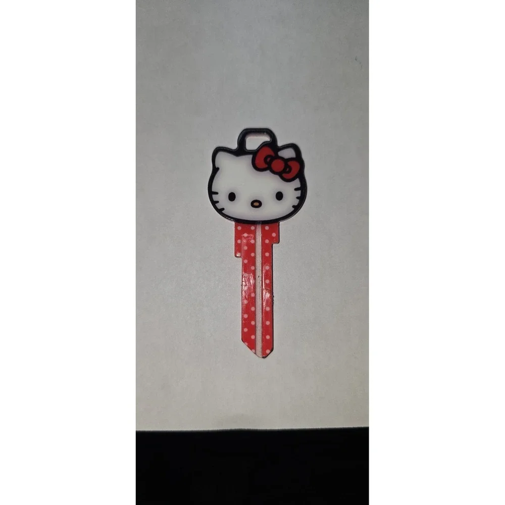 Hillman Hello Kitty Decorative Key With a red and white polka dot design Uncut